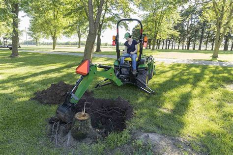 removing stumps with a compact track loader|Remove A Tree Stump Using A Backhoe, Chainsaw, and Shovel.